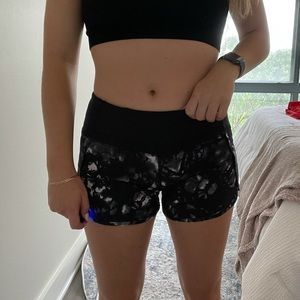 Black tie-dye lululemon are run shorts